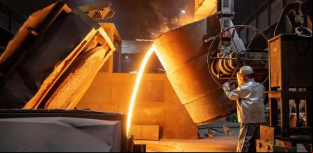 KREFELD, - APRIL 21: A worker pours molten iron into a mould at the Siempelkamp Giesserei foundry on April 21, 2022 in Krefeld, . The Siempelkamp foundry is one of many companies in 's manufacturing sector that would be acutely affected by a halt of Russian energy imports, especially natural gas. The company, which makes parts including for applications in the renewable energies sector, is one of the few in Europe that can cast pieces up to 300 tonnes. A company spokesman said that a disruption to 's natural gas supply would bring much of the foundry's manufacturing ability to a halt. In addition Siempelkamp is already facing multifold price increases for its raw materials, including scrap iron, nickel, aluminum and other metals, due to the current EU sanctions against Russia. The German government is currently wrestling with how it can reduce 's heavy dependence on Russian energy imports in the wake of Russia's military invasion of Ukraine. (Photo by Sascha Schuermann/Getty Images)