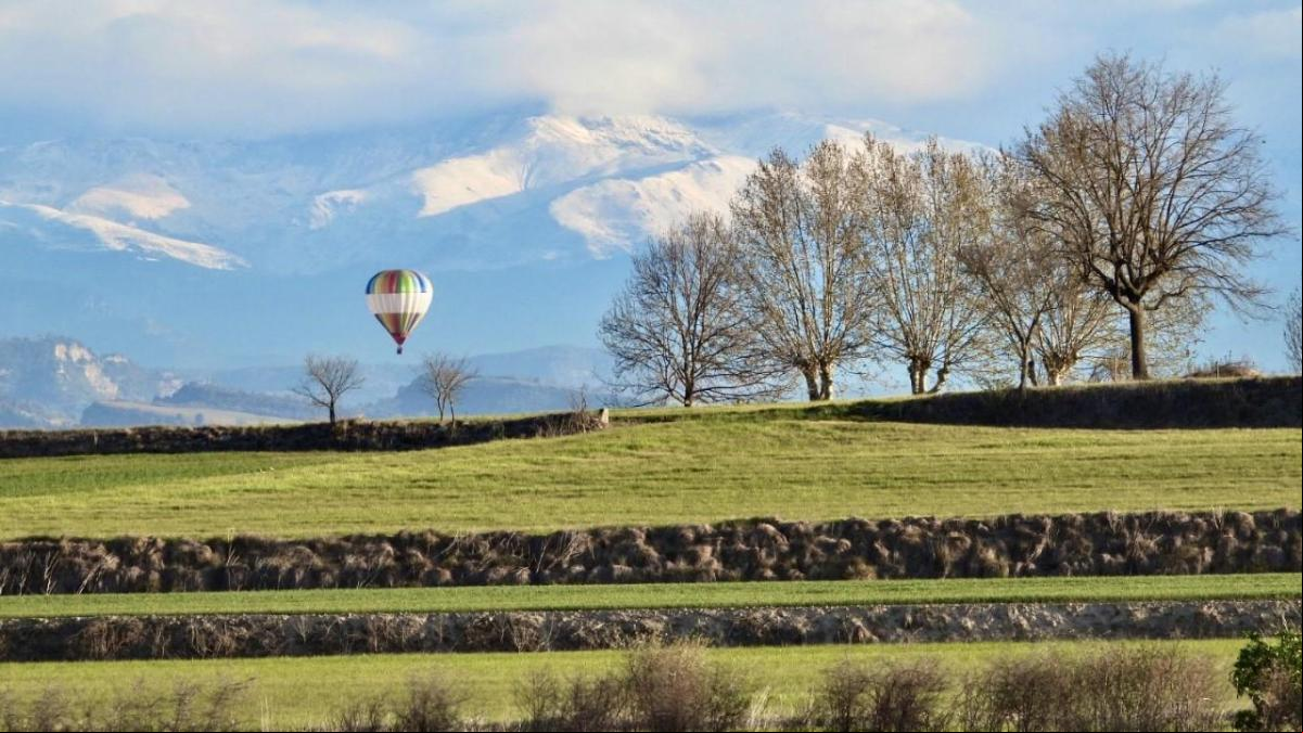 Globos y trenes al Puigmal nevado de primavera
