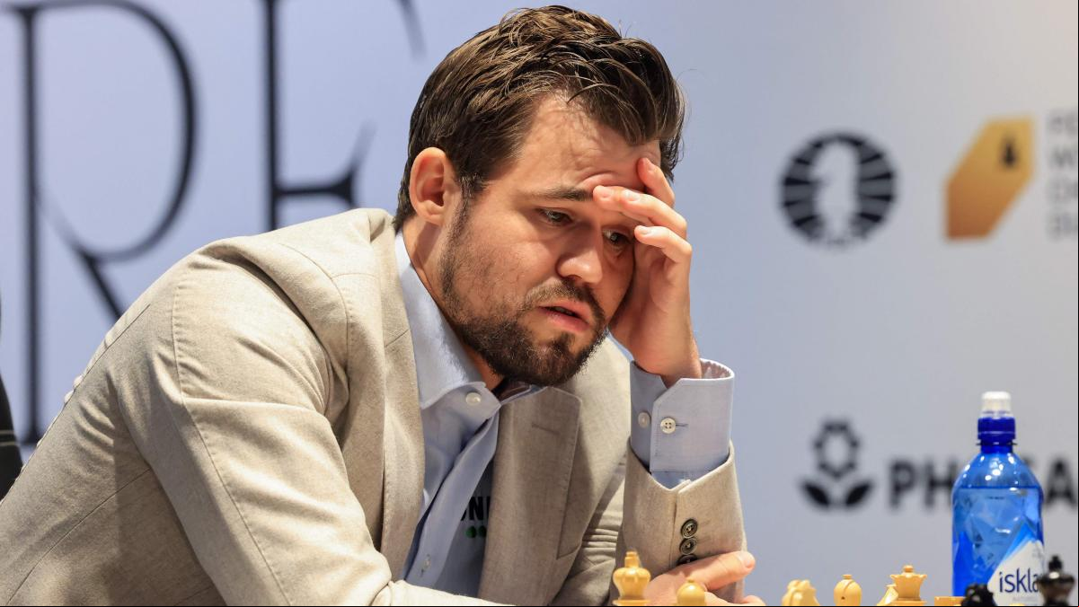 Carlsen culmina con victoria la partida más larga de un Mundial de ajedrez