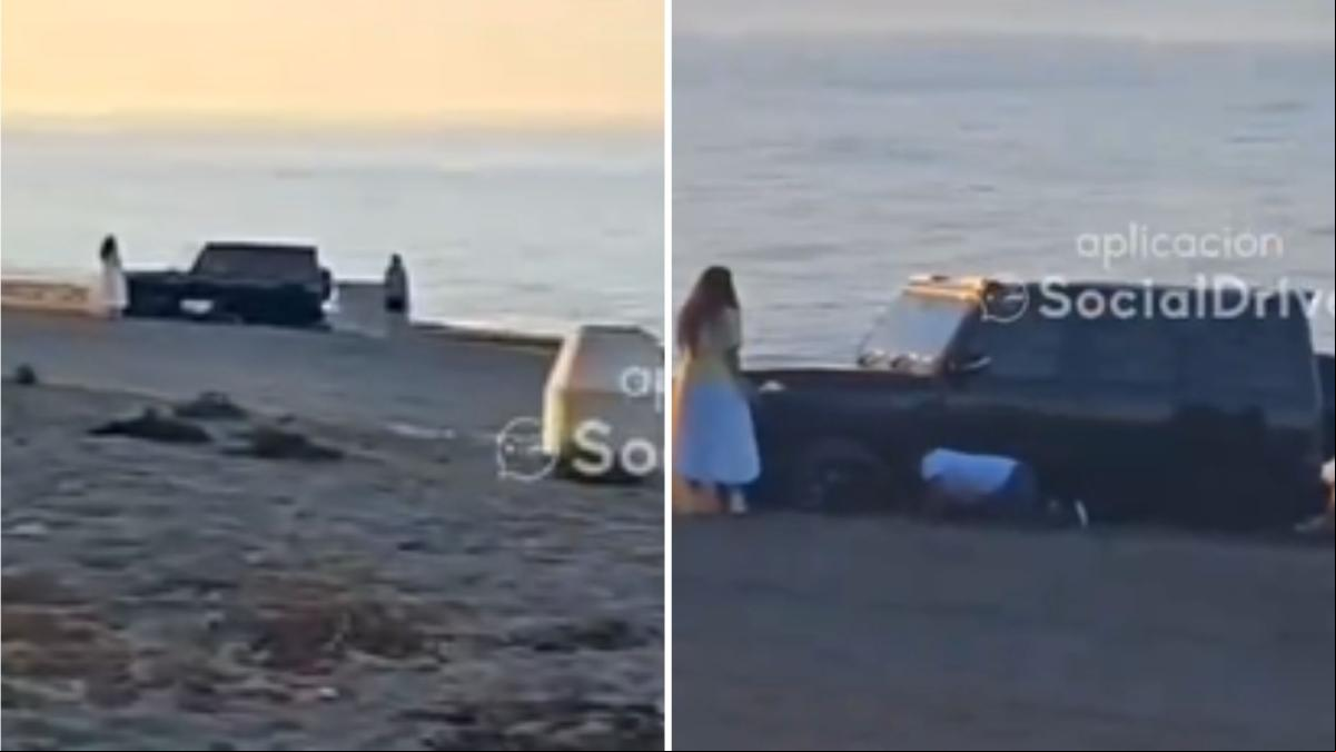 Meten el coche en la arena de una playa de Estepona para aparcar y se les queda atrapado